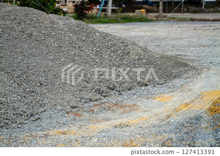 Construction site action pile of gravel urban road construction environment close-up view Construction site action pile of gravel urban road construction environment close-up view 127413391
