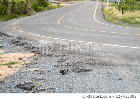 Road conditions and safety concerns rural route outdoor landscape view traffic impact Road conditions and safety concerns rural route outdoor landscape view traffic impact 127413392