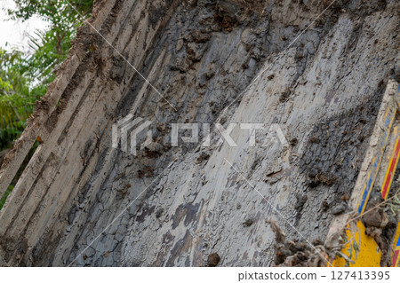 Construction site excavation urban area groundwork outdoor close-up heavy machinery 127413395