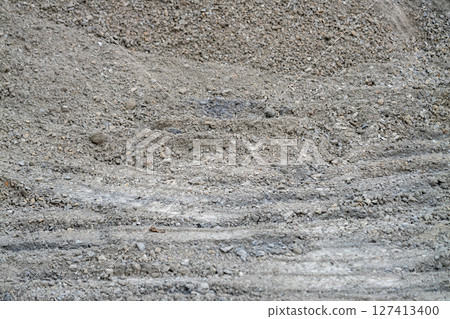 Excavation work construction site urban environment ground material close-up view industrial process 127413400