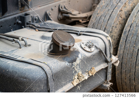 Close-up insights truck maintenance equipment in an industrial garage facility Close-up insights truck maintenance equipment in an industrial garage facility 127413566