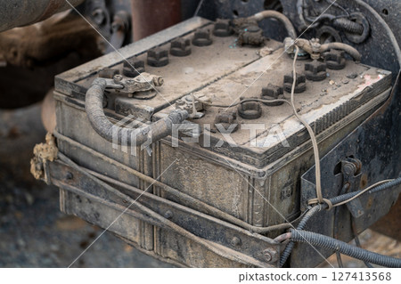 Maintenance of vintage vehicle battery garage technical insight dusty environment close-up view Maintenance of vintage vehicle battery garage technical insight dusty environment close-up view 127413568
