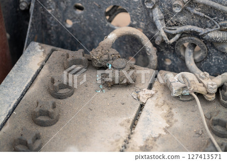Close-up view of battery corrosion workshop insights technical inspection and maintenance Close-up view of battery corrosion workshop insights technical inspection and maintenance 127413571