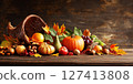 Autumn background from fallen leaves and fruits  on old wooden table. Thanksgiving day concept 127413808