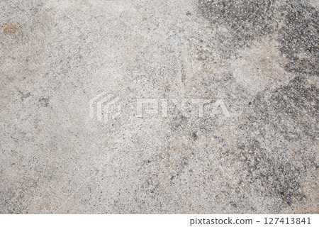 Exploring textured concrete surface in urban environment detailed image neutral lighting ground view Exploring textured concrete surface in urban environment detailed image neutral lighting ground view 127413841