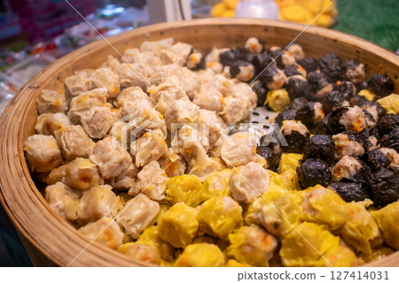 Delicious dim sum experience local market food vibrant environment close-up view culinary culture Delicious dim sum experience local market food vibrant environment close-up view culinary culture 127414031
