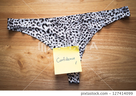 Empowering note underwear confidence unique design home setting close-up perspective 127414099