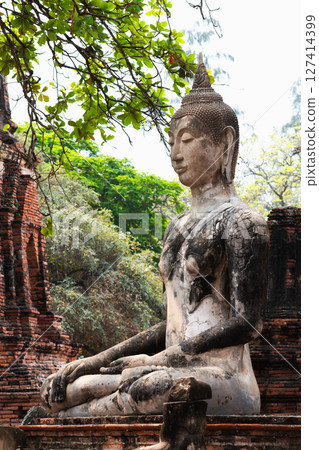 Historic buddha statue meditation ayutthaya ancient ruins close-up spiritual reflection Historic buddha statue meditation ayutthaya ancient ruins close-up spiritual reflection 127414399