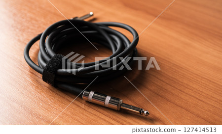 Musical equipment connection home studio warm lighting close-up sound quality 127414513