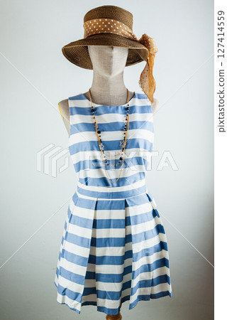 Stylish summer dress display fashion studio apparel studio front view fashion concept 127414559