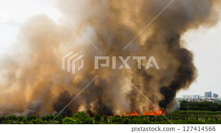 Wildfire eruption urban area natural disaster smoky environment aerial view environmental crisis 127414566