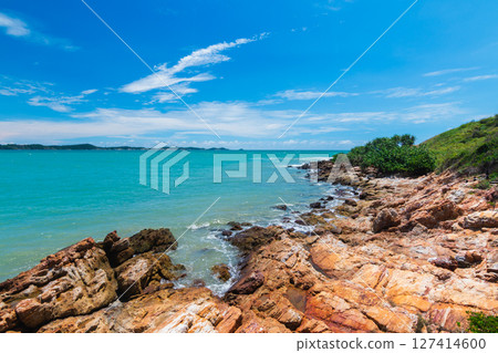 Seaside serenity coastal rock formation tropical beach nature scenic view tranquil vibes Seaside serenity coastal rock formation tropical beach nature scenic view tranquil vibes 127414600