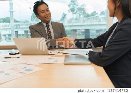 Successful Business Negotiation Between Partners 127414780