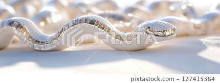 Long white robotic snake with chrome segments slithering over smooth white sand in surreal desert landscape. Robotics and automation 127415384