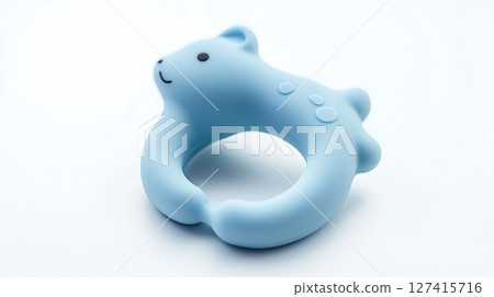 A blue bear shaped object with a white background 127415716