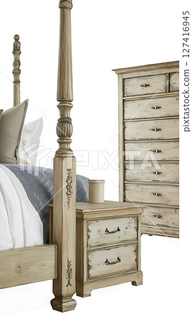 A bed with a wooden headboard and a wooden nightstand 127416945