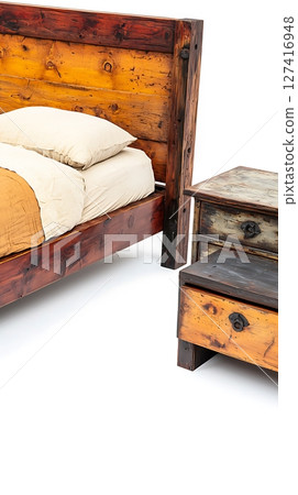 A bed and a nightstand with a wooden frame 127416948