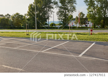 Car park with empty parking spots Car park with empty parking spots 127417011