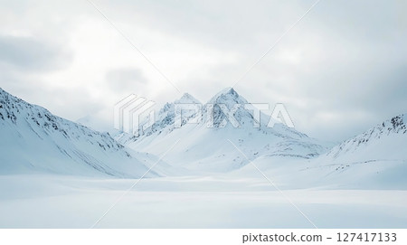 A mountain range is shown in the distance with a clear blue sky 127417133