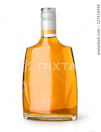 Full whiskey bottle standing on white background 127418048