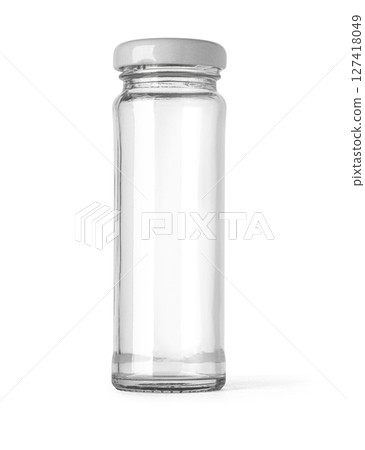 Empty glass jar with white lid standing on white background 127418049