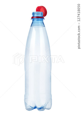 Empty plastic bottle standing on white background with red cup 127418050