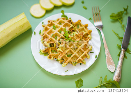 Waffles with green onions, zucchini and spices 127418504
