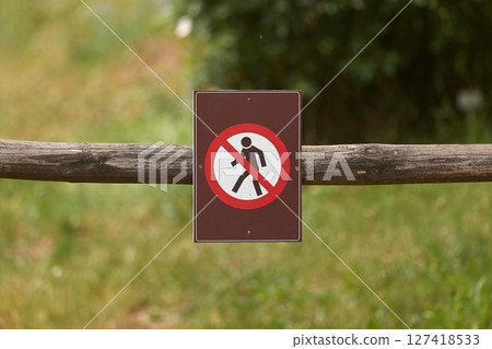 No entry sign along a nature walking path 127418533