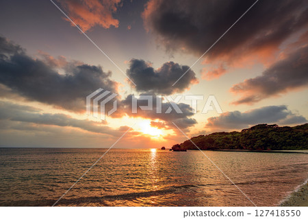 Ishigakijima sunset sky reflected in calm waves Romantic and quiet coast Ishigakijima sunset sky reflected in calm waves Romantic and quiet coast 127418550