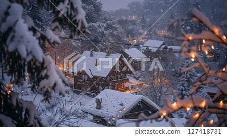 A serene village covered in snow on Christmas evening, amidst a swirling snowstorm adding to the festive, wintry charm. 127418781