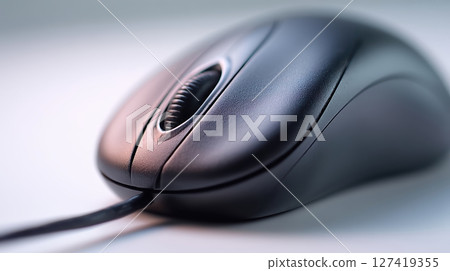 Ergonomic desk setup featuring a left-oriented computer mouse and minimal modern design elements Ergonomic desk setup featuring a left-oriented computer mouse and minimal modern design elements 127419355