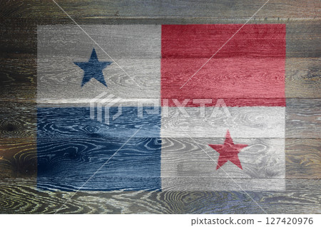 Panama flag on rustic old wood surface background Panama flag on rustic old wood surface background 127420976