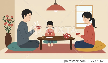 A peaceful time with the whole family at the dinner table, smiling and chatting 127421670