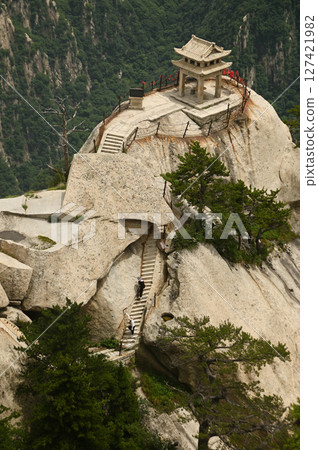 Chess Pavilion from the East Peak Hiking to see the many peaks of Huashan Mountain is one of the most famous tourist attractions in China. Chess Pavilion from the East Peak Hiking to see the many peaks of Huashan Mountain is one of the most famous tourist attractions in China. 127421982