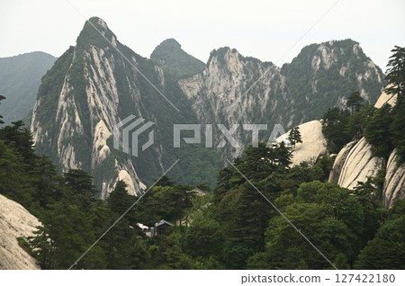 Mount Huashan is one of the most famous tourist attractions in China and one of the must-do activities is rock climbing and hiking. It is a sacred mountain, home to many deities. 127422180
