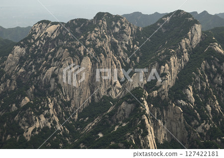 Mount Huashan is one of the most famous tourist attractions in China and one of the must-do activities is rock climbing and hiking. It is a sacred mountain, home to many deities. Mount Huashan is one of the most famous tourist attractions in China and one of the must-do activities is rock climbing and hiking. It is a sacred mountain, home to many deities. 127422181