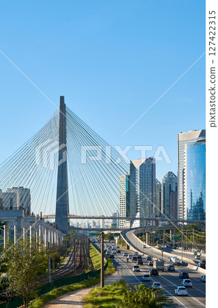 Cityscape with cable-stayed bridge, and city traffic in Sao Paulo city. 127422315