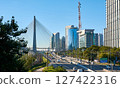 Cityscape with cable-stayed bridge, and city traffic in Sao Paulo city. 127422316