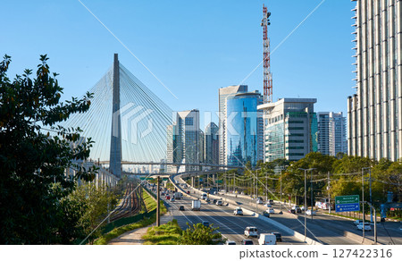Cityscape with cable-stayed bridge, and city traffic in Sao Paulo city. 127422316