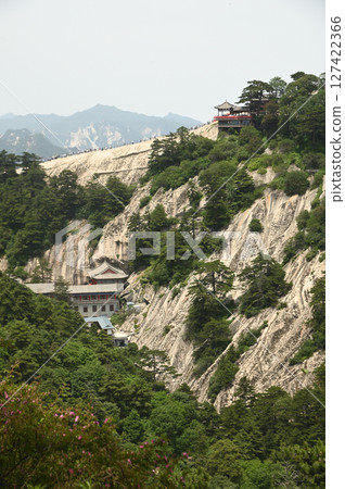 The Taoist temple is located on Mount Huashan, an important religious site and one of the most famous tourist attractions in China. 127422366