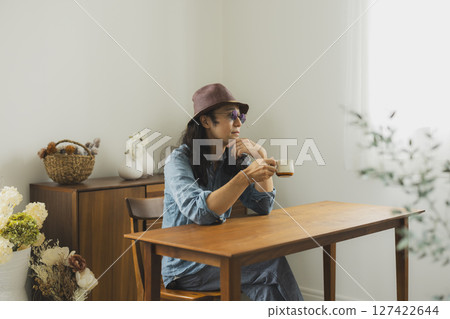 Man with long hair and hat Man with long hair and hat 127422644