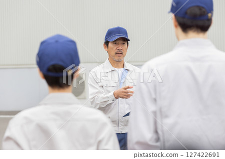Group of workers meeting outdoors 127422691