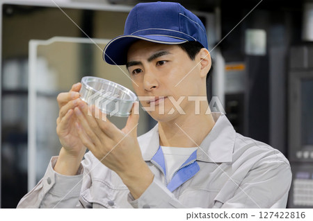 workers working in a factory workers working in a factory 127422816