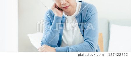 Troubled middle-aged woman Troubled middle-aged woman 127422832