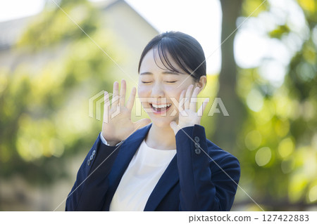 Young woman in a suit Young woman in a suit 127422883