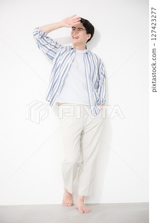 A man wearing a shirt: A dazzling middle-aged man's whole body A man wearing a shirt: A dazzling middle-aged man's whole body 127423277