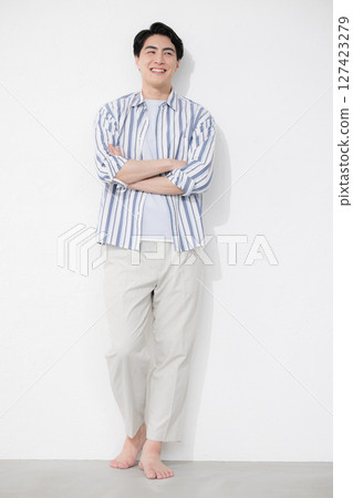 A man wearing a shirt, a middle-aged man with his arms crossed, full body A man wearing a shirt, a middle-aged man with his arms crossed, full body 127423279