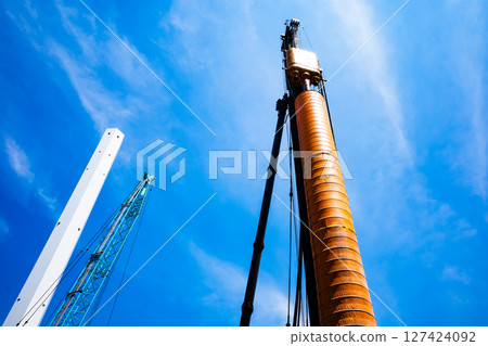 Heavy machinery stretching out against the blue sky Redevelopment in Tokyo a-2 High saturation contrast Heavy machinery stretching out against the blue sky Redevelopment in Tokyo a-2 High saturation contrast 127424092