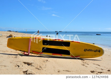 Surfboard on the beach 127424498