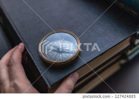 Technical books and compass Technical books and compass 127424885